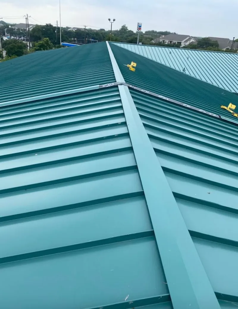 Green commercial metal roof ridge and valley for Metal Roof Repair in Pleasant Prairie